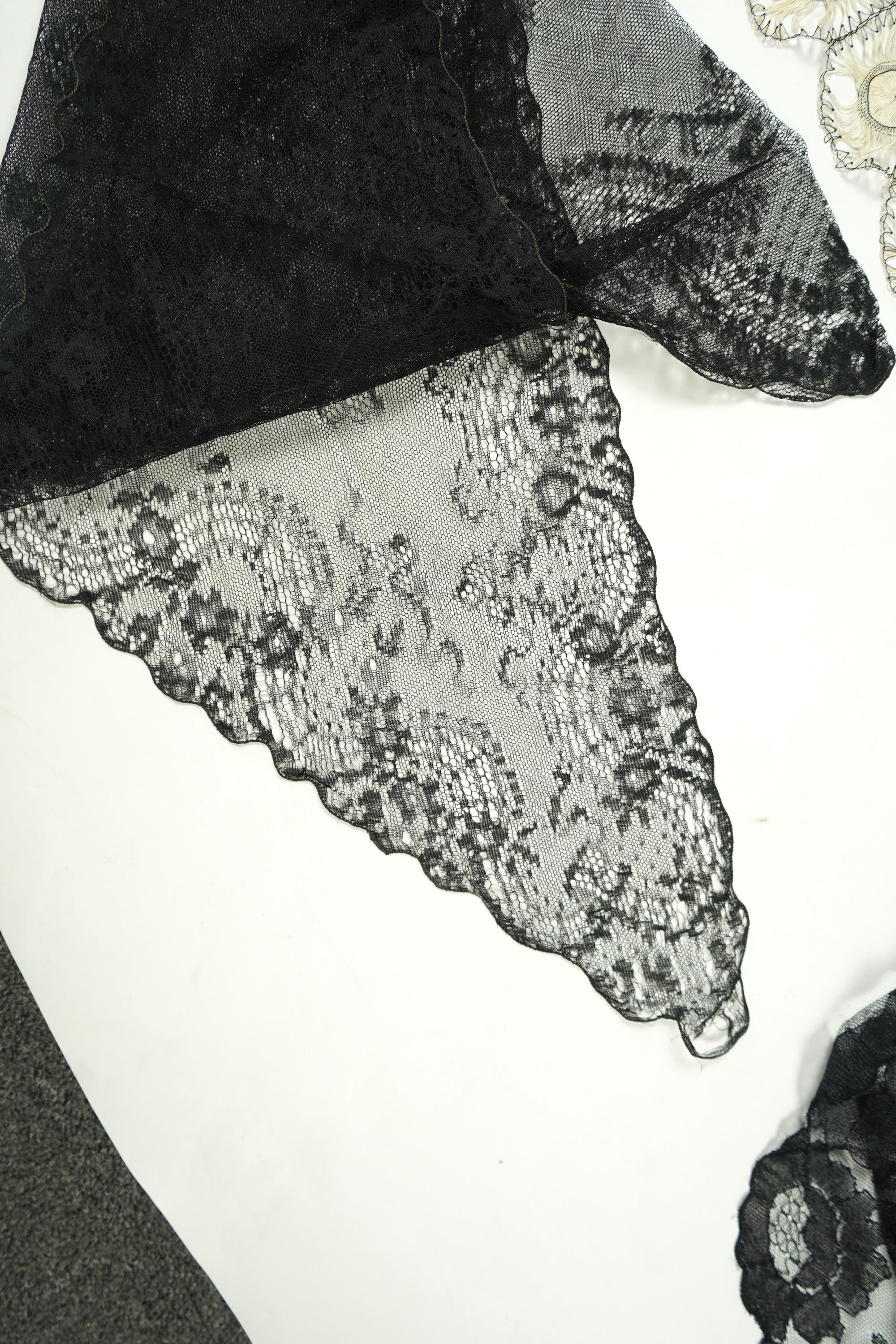 A fine cream and black silk ‘tatting’ stole, two black silk stoles, two bonnet veils and various collars and small triangular mantilla etc. Condition - some damage to bonnet veil., Tatting stole 184cm long.